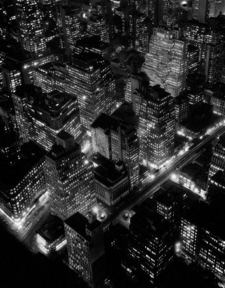 A nighttime view of New York City, USA, 1932. (Photo by Berenice Abbott/Getty Images)